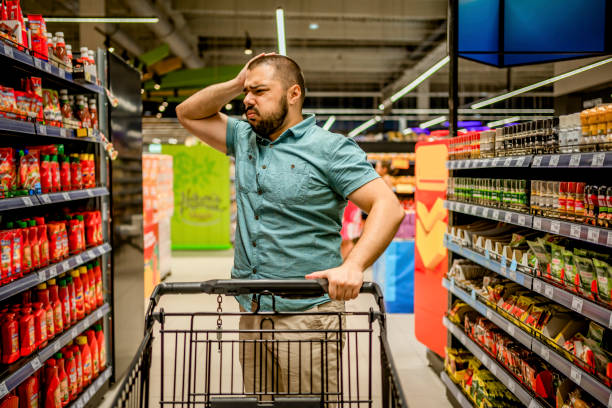 Man feeling upset about the increase in food prices