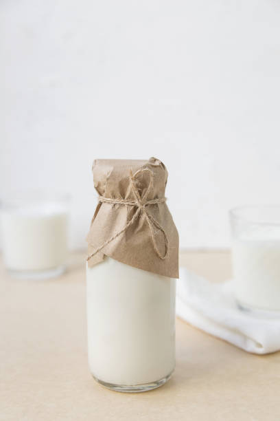 istock Ayran in a glass bottle on a light background 1419093014