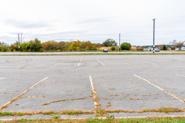 istock Empty parking lot on a cloudy autumn day 1419093824
