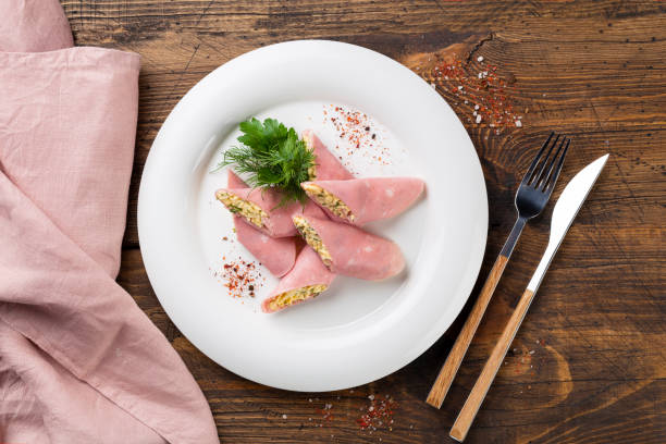 ham rolls on a white plate stock photo