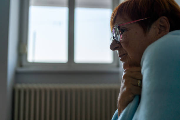 istock Senior woman feeling the cold in her home 1419095931