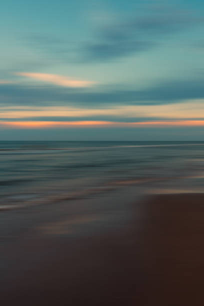 istock Beautiful sunset sky and ocean nature background with planning motion blur 1419100728