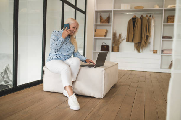 istock Pretty young self-employed woman workring from home 1419101284