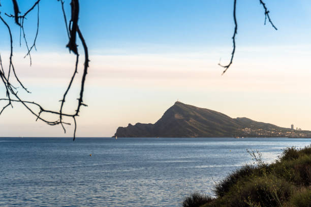Mountain in the sea at dusk, Serra Gelada (Alicante, Spain)