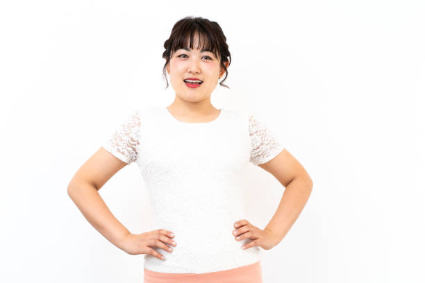 istock young woman with hands on waist 1419108305
