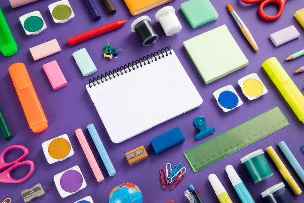 istock School Supplies on Purple Background 1419112529