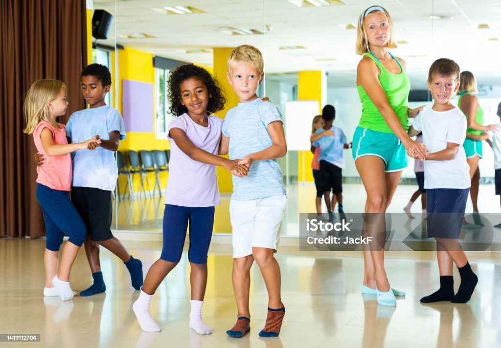 Little boys and girls dancing pair dance in the ballet studio 30-34 Years Stock Photo