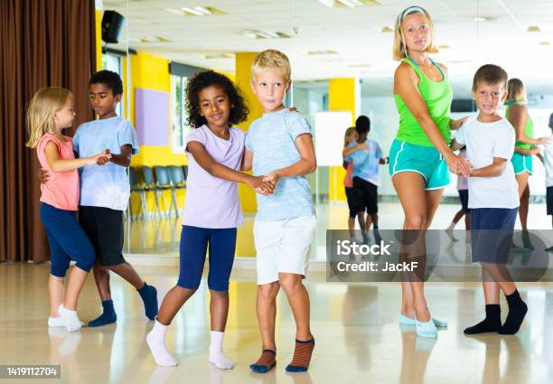 Little Boys And Girls Dancing Pair Dance In The Ballet Studio Stock Photo - Download Image Now