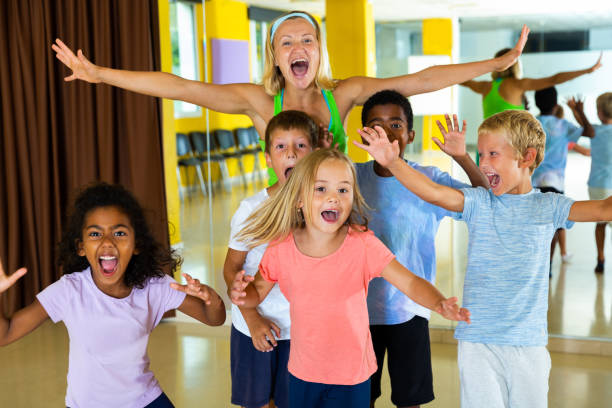 istock Happy children in dance studio smiling and having fun 1419112730