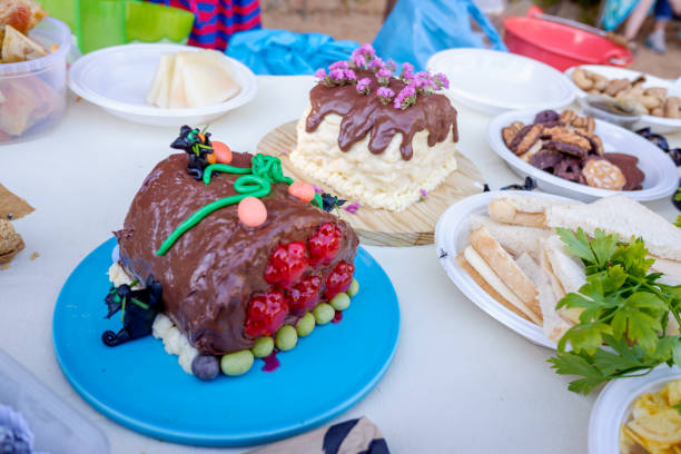 istock Birthday table with various homemade cakes and pies 1419116137