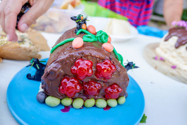 Birthday table with various homemade cakes and pies