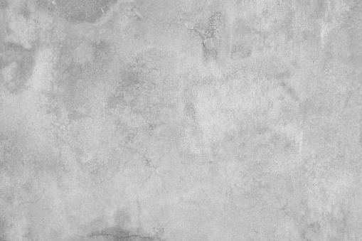 La textura de la pared antigua de cemento gris sucio con fondo negro abstracto gris y diseño de color plateado son claros con fondo blanco. photo