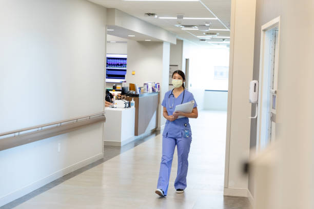 istock Nurse walking down the hallway 1419121162