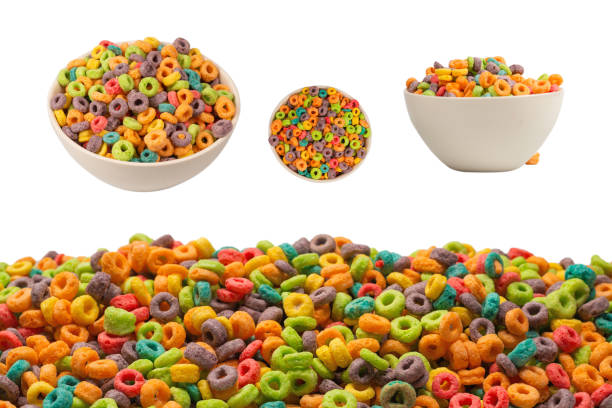 istock Colorful rings cereal spill out into a bowl. Breakfast. Isolated. 1419121404