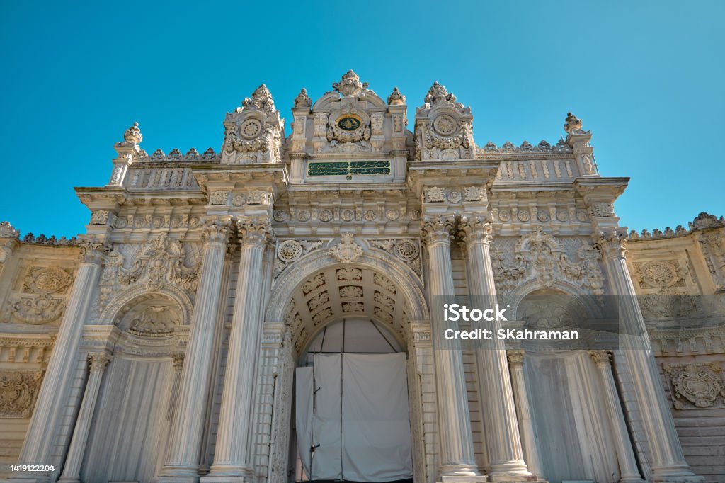 Entrance gate of Dolmabahce palace in Istanbul. Entrance gate of Dolmabahce palace in Istanbul. Low angle view of iconic baroque style gate. 03.04.2021. istanbul. Turkey. Adventure Stock Photo