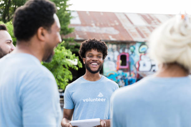 istock Smiling young university student organizes graffiti clean-up event 1419122248
