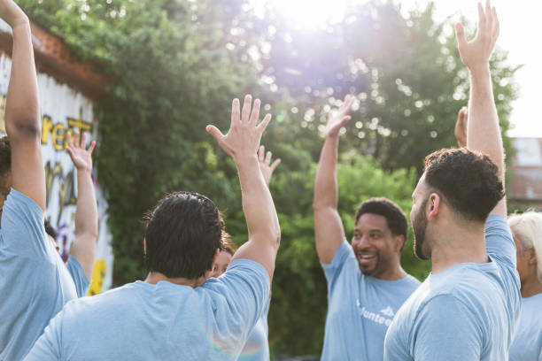 istock In morning, diverse volunteer group cheers 1419122274