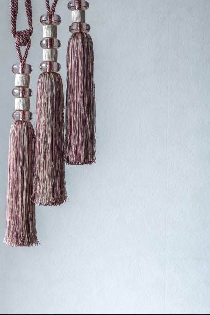 istock Thread tassels for curtains, tablecloths, design elements, isolated on a white background. 1419123168