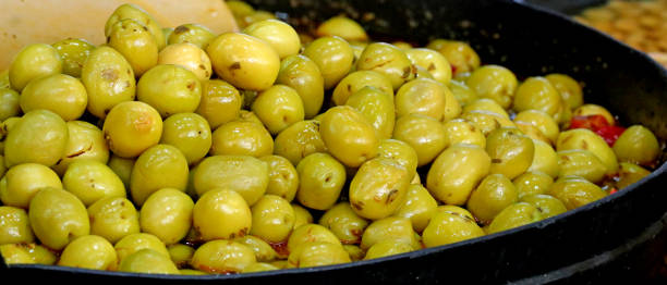 istock Large cauldron of Spanish olives with dressing 1419123475
