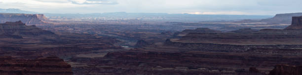 istock Endless Layers of Rock On The White Rim Panorama 1419124648