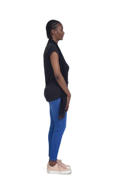 istock side view of a woman standing on white background 1419127196