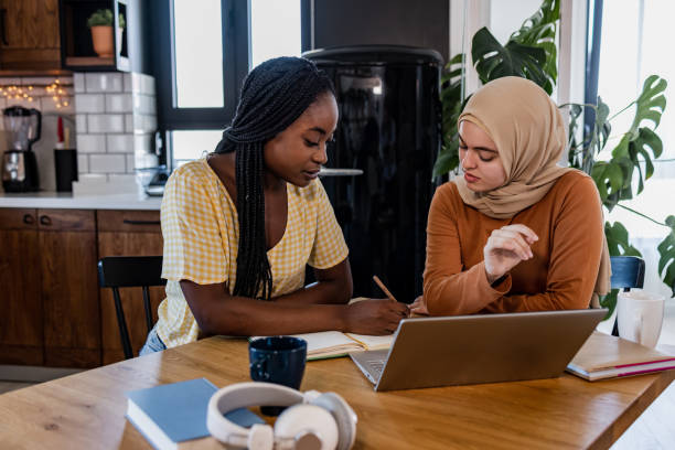 istock Diverse friends studying together 1419127223