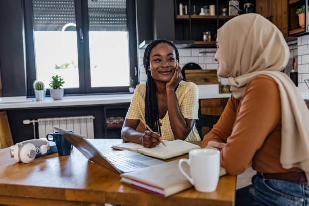istock African American and Middle Eastern young woman studying together 1419127372