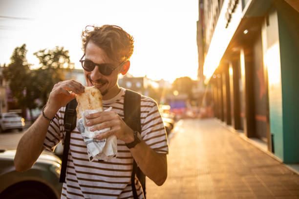 istock I enjoy fast food and walking around town 1419133075