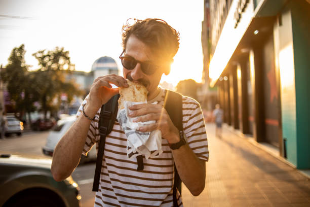 istock I enjoy fast food and walking around town 1419133079
