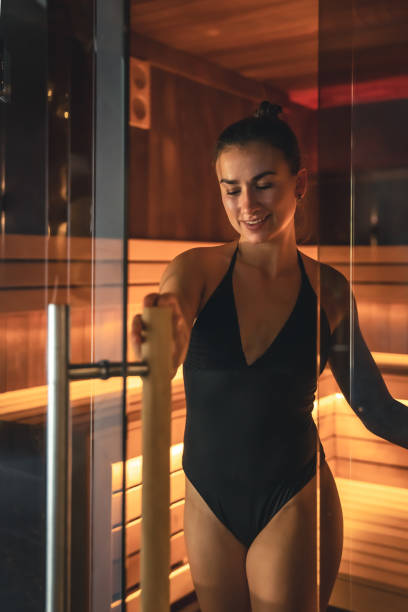 istock A young woman having rest in sauna alone. 1419136057