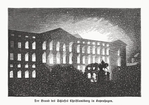 The fire of the second Christiansborg Palace in Copenhagen, Denmark in October 1884. The ruins remained in place for the following 23 years due to political fighting. Wood engraving, published in 1885.