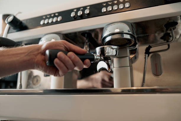 istock Process of pouring ground coffee into the filter 1419141526