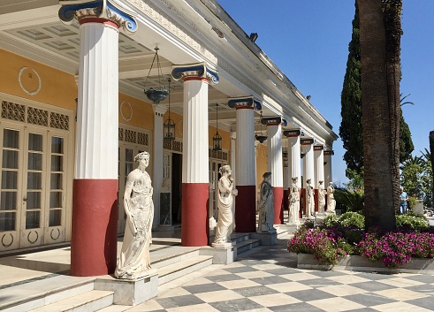 Corfu, Greece May 2018 ,  Statues of classical muses in the formal  Achilleion garden