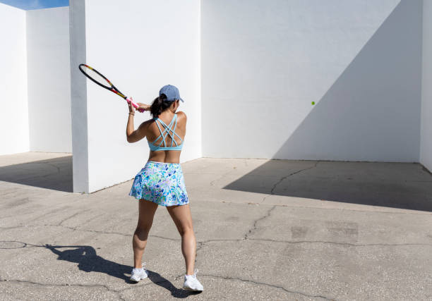 istock Female tennis player practicing on handball court 1419143749