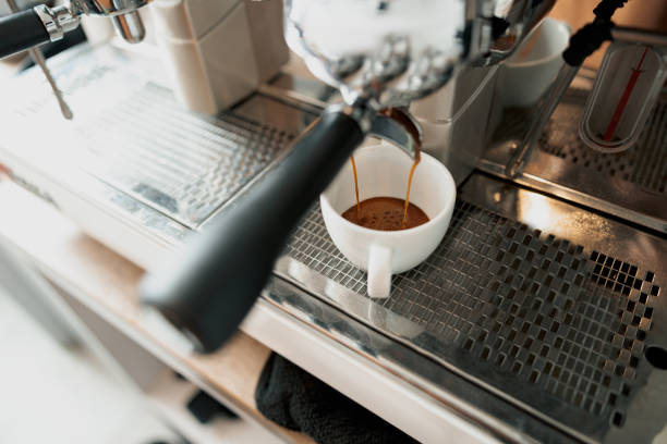 istock Professional coffee machine brewing coffee in cafeteria 1419143810