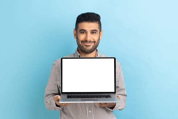istock Cheerful business holding laptop with empty screen, copy space for image or text. 1419143940