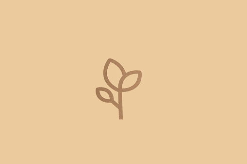 Draw of a plant on a brown backgound with copy space