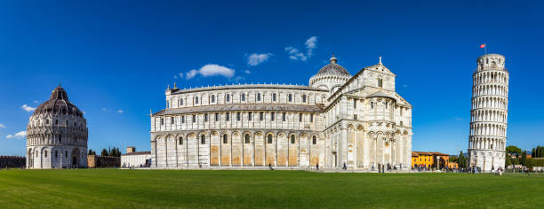 Pisa Cathedral and the Leaning Tower in a sunny day in Pisa, Italy. Pisa Cathedral with Leaning Tower of Pisa on Piazza dei Miracoli in Pisa, Tuscany, Italy. Pisa Cathedral and the Leaning Tower in a sunny day in Pisa, Italy. Pisa Cathedral with Leaning Tower of Pisa on Piazza dei Miracoli in Pisa, Tuscany, Italy. pisa leaning tower of pisa tower famous place stock pictures, royalty-free photos & images