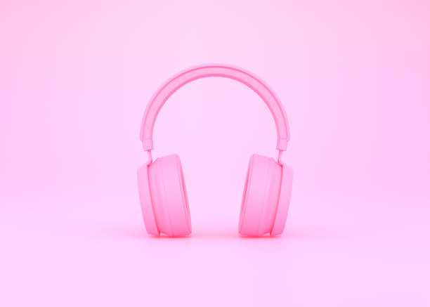istock Wireless headphones on a pink background 1419145894