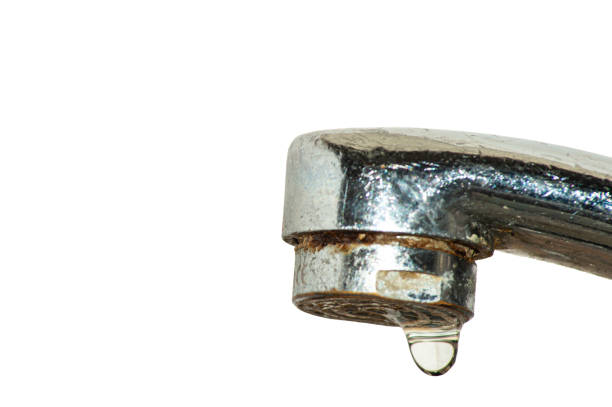 istock Tap closeup with dripping water-drop. Water leaking, saving concept. 1419145930