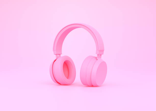 istock Wireless headphones on a pink background 1419146226