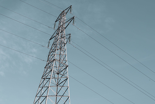 Electricity pylon or transmission tower against a blue sky.  Belfast, Northern Ireland.