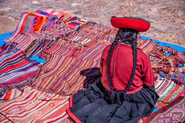 istock Peruvian woman selling souvenirs, The Sacred Valley, Peru 1419150954