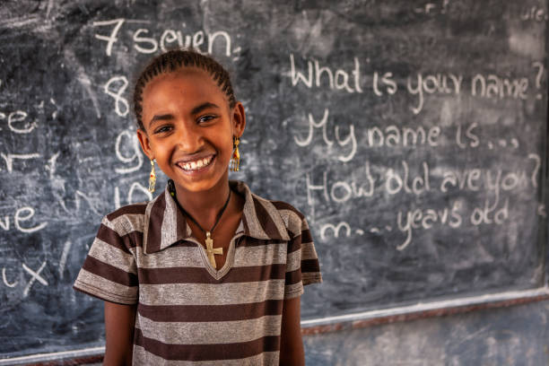 istock African little girl is learning English language 1419151031