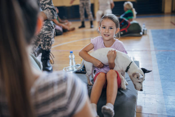 istock Little girl with dog 1419151170