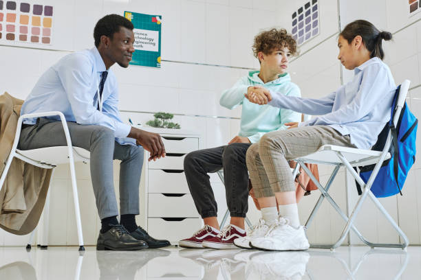 istock Children Resolving Conflict in Therapy Session 1419157239