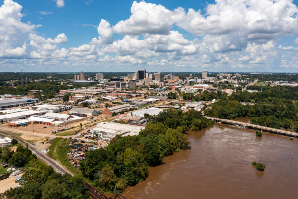 Jackson, MS Skyline with flooding Pearl River in the foreground in August 2022