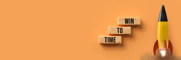 istock cubes with message TIME TO WIN and a starting rocket - 3d illustration 1419163508
