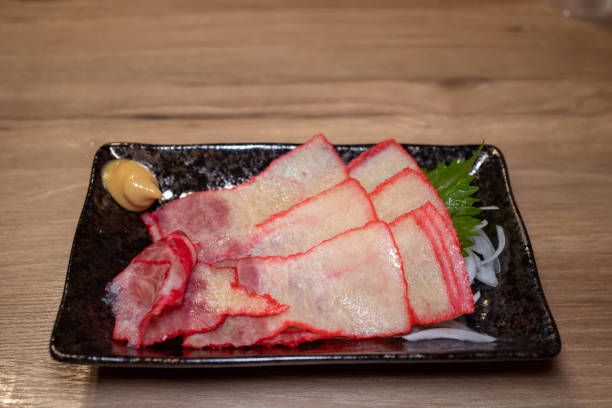 Whale meat bacon in Japanese Izakaya bar stock photo