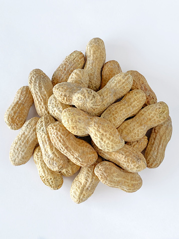 Pile of peanuts in nutshells